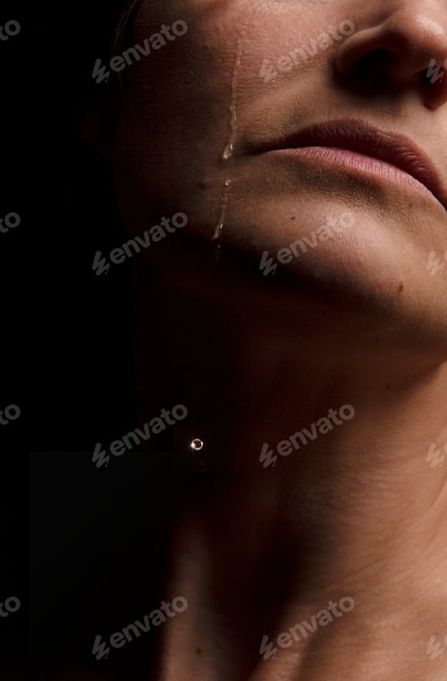 Preview: Tear slips down a woman's face