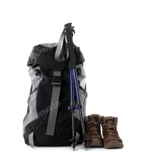 Preview: Pair of trekking poles and camping equipment for tourism on white background