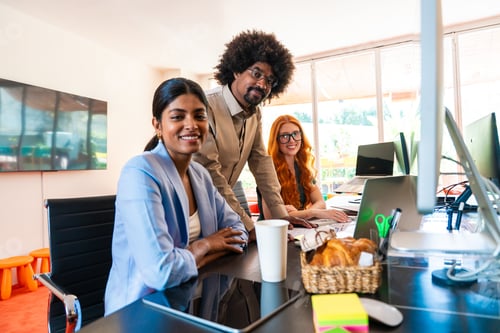 Preview: Multiethnic small group of businesspeople meeting in a coworking company office