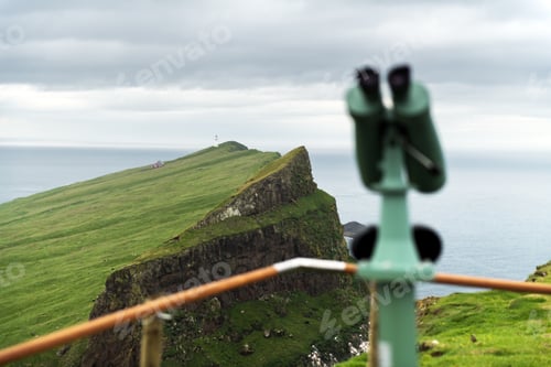 Preview: Foggy view of old lighthouse on the Mykines island