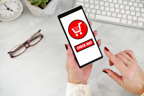 Preview: Female using cell phone to shop online - red shopping cart with checkout check out button