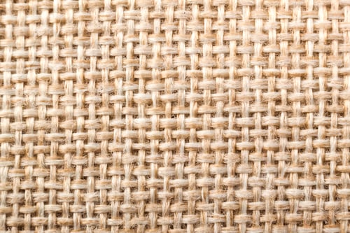 Preview: Natural fabric linen texture for design, sackcloth textured. Brown and yellow canvas background