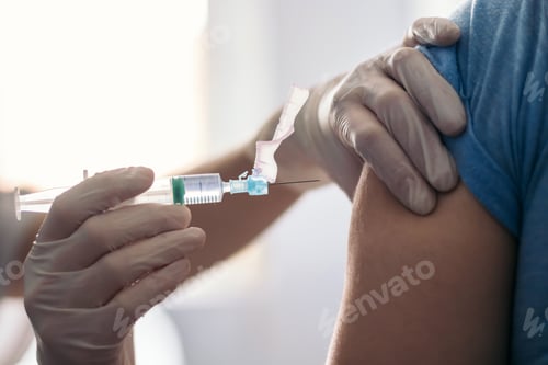 Preview: Vaccine in injection needle.