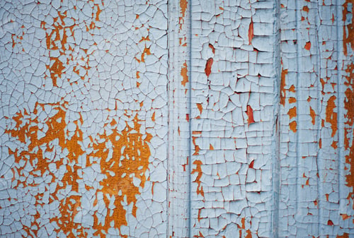 Preview: Wooden wall with blue paint is severely weathered and peeling