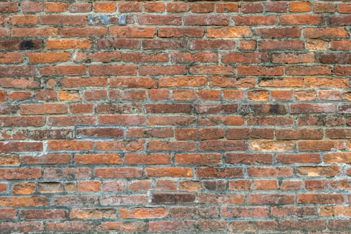 Preview: Weathered old red brick background with rough surface.