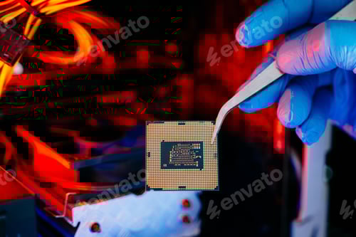 Preview: The technician is putting the CPU on the socket of the computer motherboard. electronic