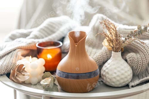 Preview: Aroma composition with a modern aroma oil diffuser and a knitted element.