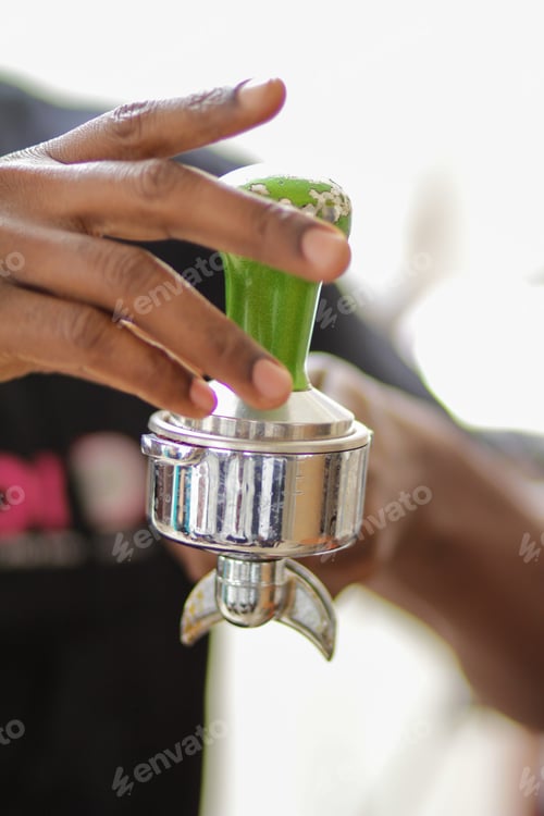 Preview: coffee beans grinds on the silver coffee maker