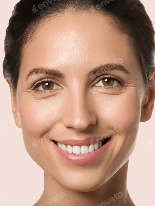 Preview: Woman beauty face healthy skin natural clean fresh face. Close up view. Color background. Pink