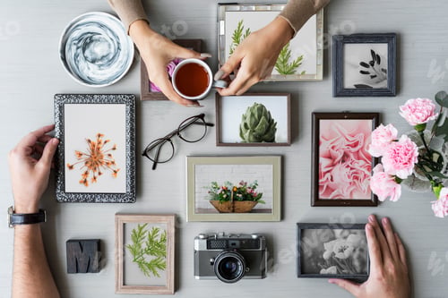 Preview: Hand with Photo Frame on Gray Background