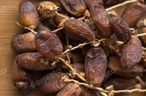 Preview: Natural dried palm fruit isolated. Food concept photo.