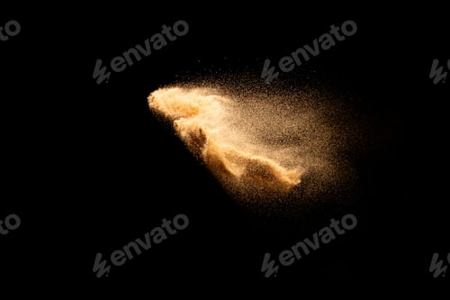 Preview: Sand flying explosion isolated on black background ,throwing freeze stop motion object design.