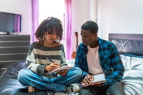Preview: Students sharing notes and studying together on bed