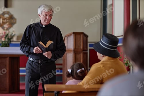 Preview: Priest reading sermon in the church