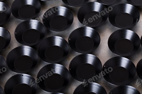 Preview: Black metal baking pan for muffins.