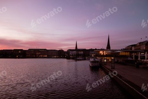 Preview: Romantic scene on the shore at sunset in Hamburg, Germany