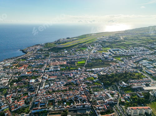 Preview: Coastal urban sprawl with visible airport