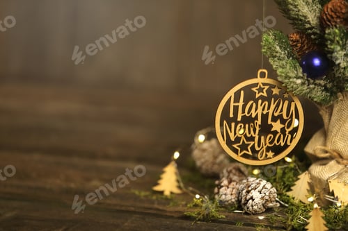Preview: A big wooden toy on the Christmas tree partially in baubles