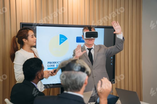Preview: During the workplace meeting, the business team used a virtual reality headset.
