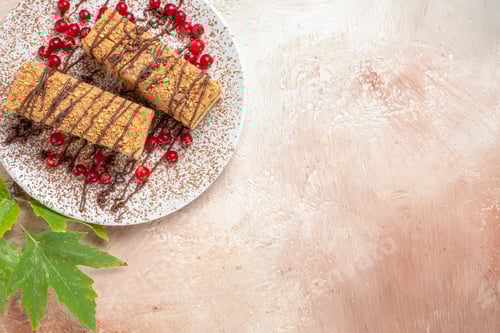 Preview: top view cake slices with choco icing and berries on light background biscuit cake sweet