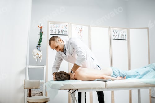 Preview: Physiotherapist doing manual treatment