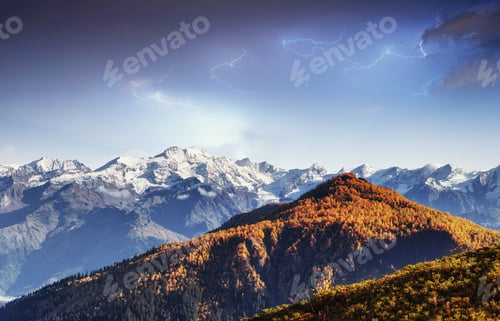 Preview: Fantastic collage. Beautiful lightning over the snow-capped moun