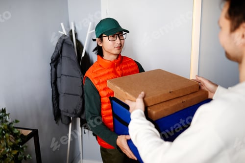 Preview: Courier delivering pizza to home