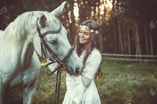 Preview: Young woman in beautiful white dress and her beautiful horse