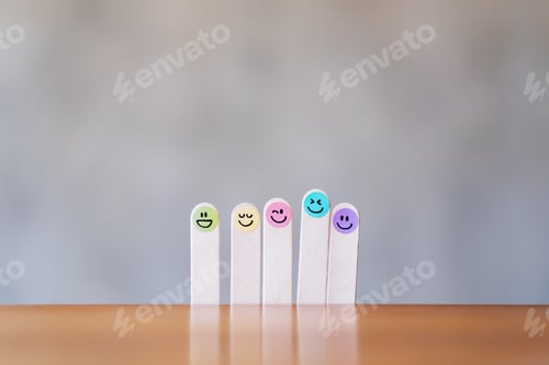 Preview: Colorful hand draw happy emotion faces on wooden stick with background