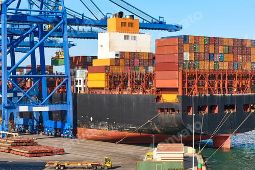 Containers on a vessel. Global market. Cargo shipping. International economy