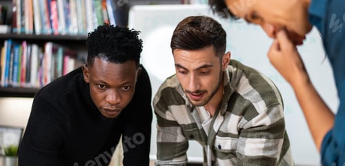 Preview: Young diverse creative designers discussing and brainstorming work together
