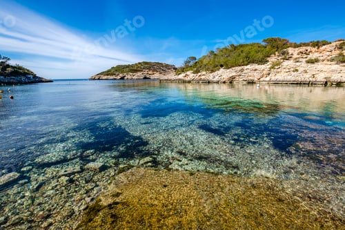 Preview: Cala Portinax bay with beautiful azure blue sea water
