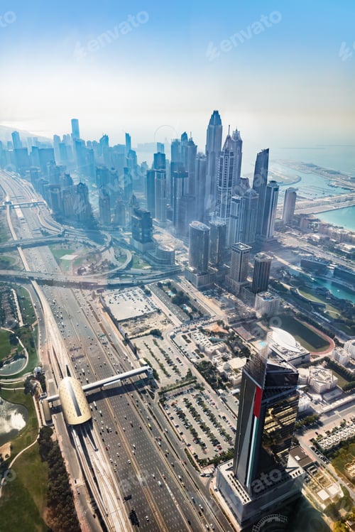 Preview: Dubai aerial view of marina skyscrapers at sunset.