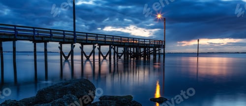 Preview: Wooden Quay at Rocky shore on Pacific Ocean West Coast. Sunset.