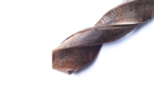 Preview: Closeup shot of an old rusty drill bit isolated on a white background