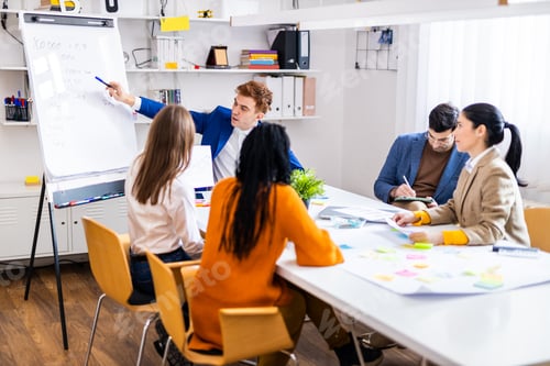 Preview: Business team working in a start-up office