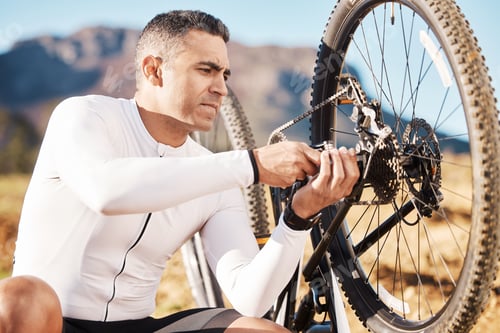 Preview: Cycling, repair and wheel with man and focus for sports, wellness and fitness training. Adventure,