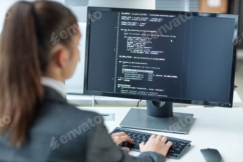 Preview: Female Programmer Using Computer