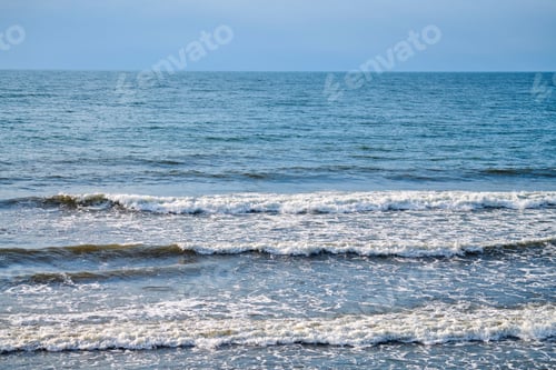 Preview: Deep blue sea waters splashing with foamy waves, dark blue wavy ocean water surface, copy space