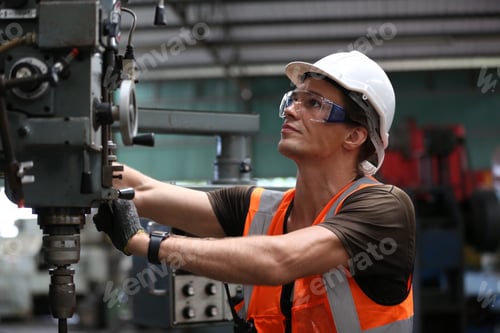 Preview: industrial factory employee working in metal manufacturing industry