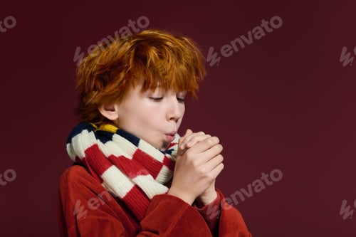 Preview: Stylish redhead boy warms up while showcasing trendy outfit in studio setting