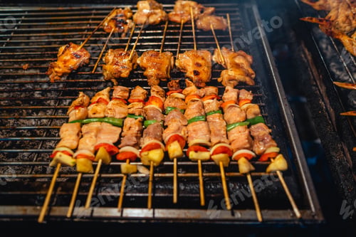 Preview: Barbecue skewers on a street side grill