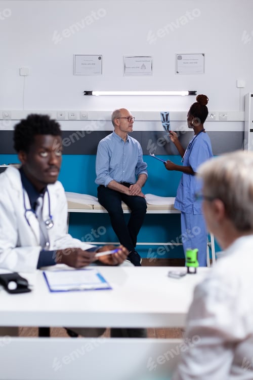 Preview: African american medic discussing with old woman