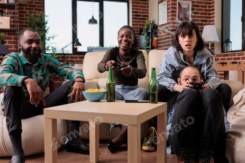 Preview: Cheerful people having fun with video games competition