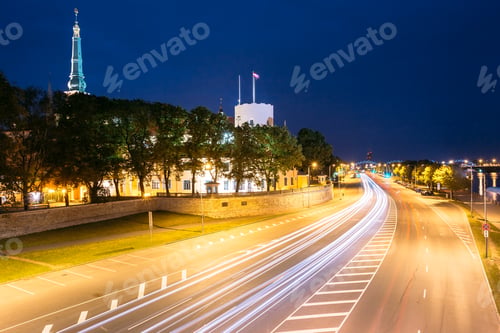 Preview: Riga Latvia. Night View Of 11 November Embankment In Bright Illu