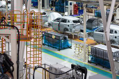 Preview: Car bodies are on assembly line. Factory for production of cars. Modern automotive industry