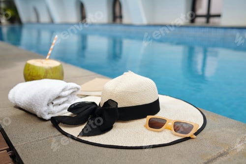 Preview: Enjoying Relaxation by Poolside with Straw Hat