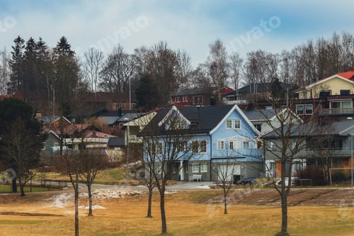 Preview: Charming Norwegian homes on a serene landscape during early spring