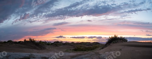 Preview: Desert sunset painting the sky with vibrant colors