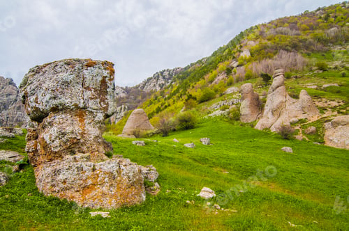 Preview: Huge stone in a mountain valley